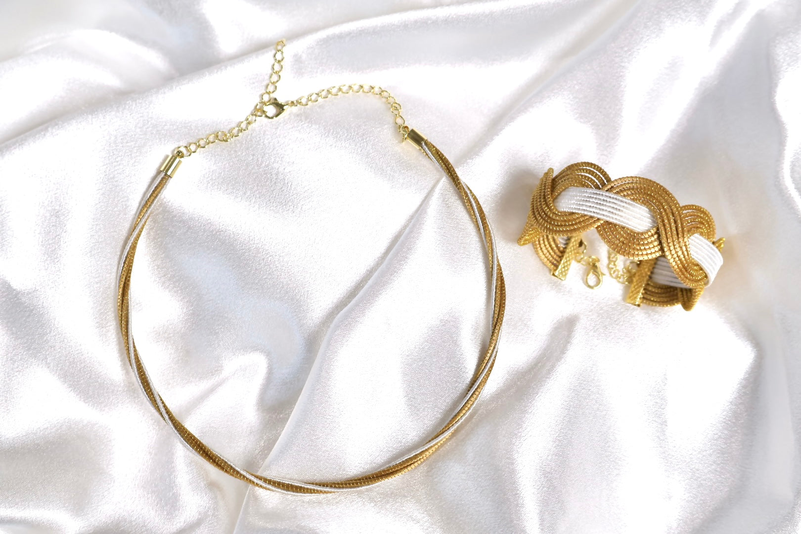 Golden grass jewlery set choker and bracelet cuff displayed 