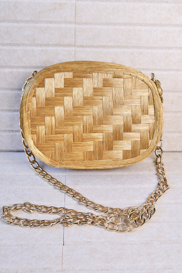 golden grass woven crossbody bag with gold chain zipper and velvet lining AquaBrasil