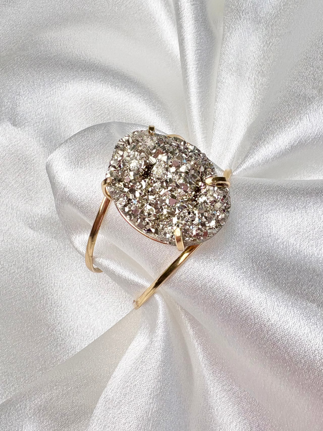 statement pyrite cuff with large oval natural stone on 18k gold plated adjustable band handcrafted by AquaBrasil