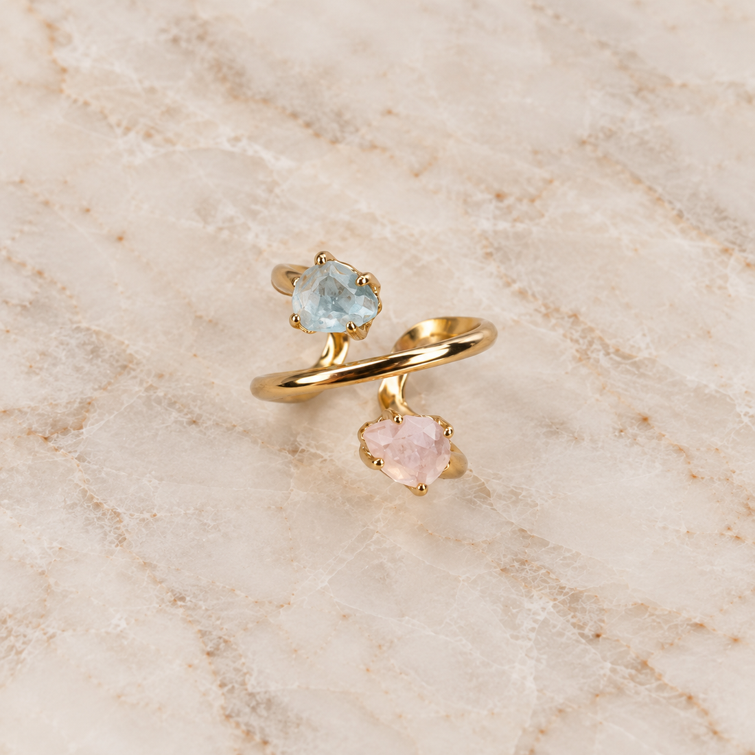 Aquamarine and Rose Quartz spiral ring with natural pear-shaped faceted gemstones and adjustable 18K gold-plated band
