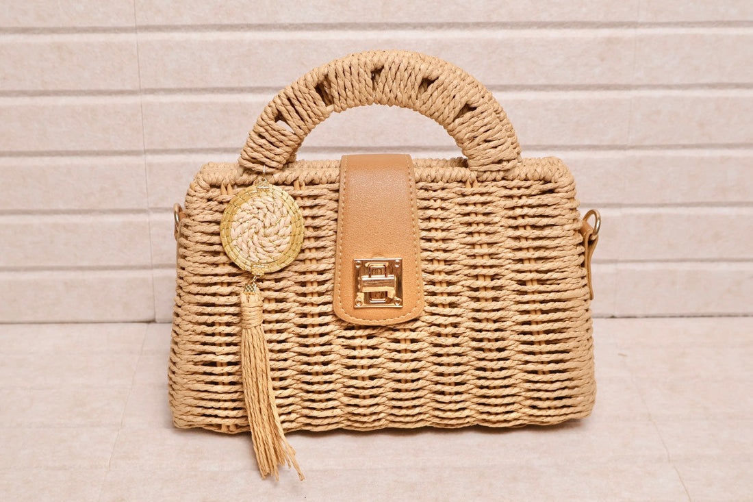 structured rattan top handle bag with vegan leather flap and golden grass charm AquaBrasil
