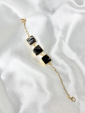 Obsidian bracelet with three black crystals on 18k gold plated chain handcrafted by AquaBrasil