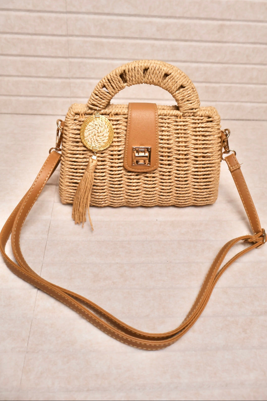 Rattan clutch bag with vegan leather strap and Brazilian golden grass strap. AquaBrasil
