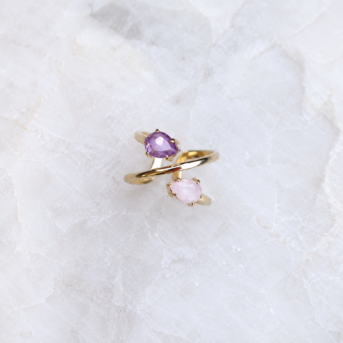 Rose Quartz and Amethyst double gemstone spiral ring with pear-shaped faceted stones and 18K gold-plated adjustable band