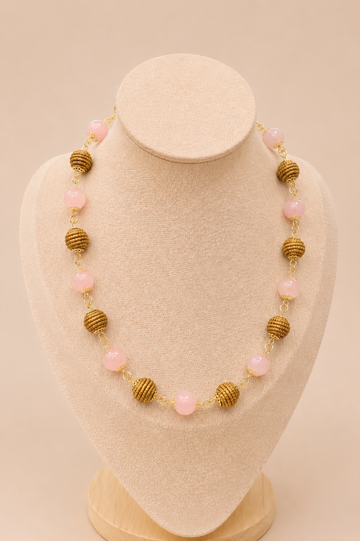 Natural Rose Quartz and handwoven Brazilian golden grass beaded necklace with 18K gold-plated details