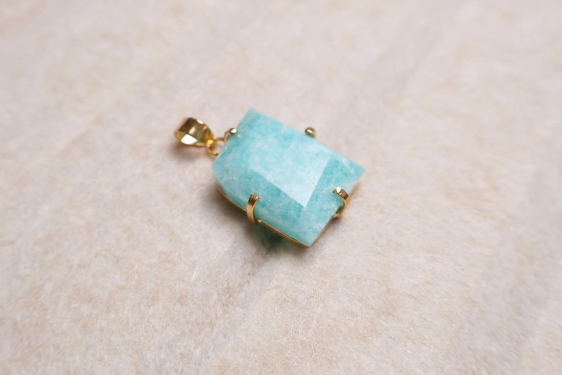 free form blue amazonite statement pendant set in 18k gold plated frame handcrafted by AquaBrasil