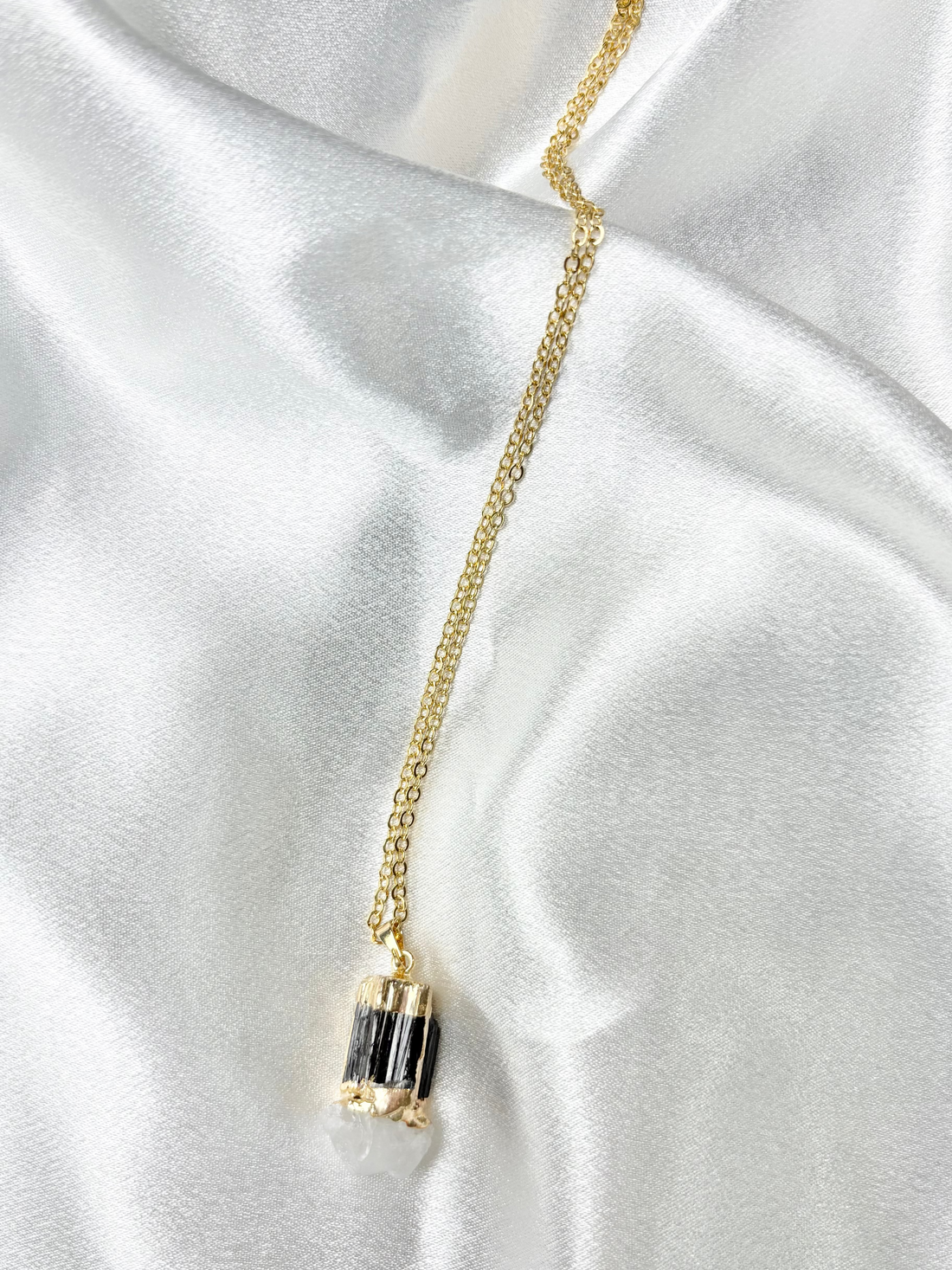 Black tourmaline and clear quartz bonded pendant necklace on 18k gold plated chain handcrafted by AquaBrasil