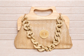 woven handbag with natural wood handle and golden grass mandala accent AquaBrasil